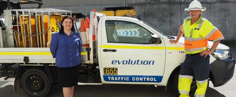 William standing next to work ute
