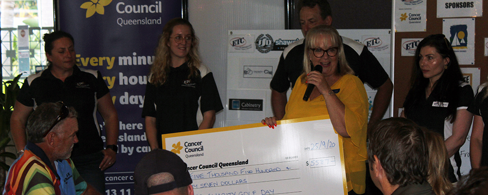 Cancer council presenting a cheque