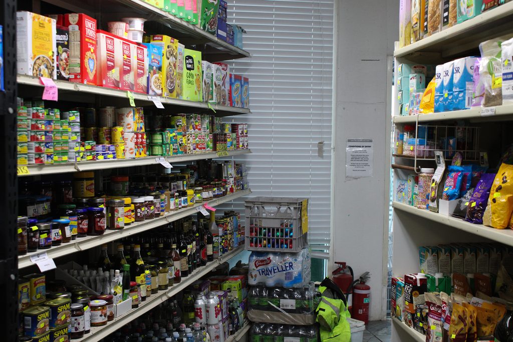 Shelves stocked with affordable groceries inside New Life Foodbarn